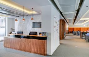 办公室前台奶茶色墙面设计图