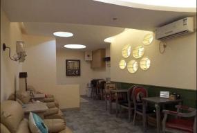 美甲店接待台背景墙装修效果图