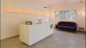 时尚混搭风办公室前台装修图