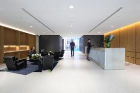 小型现代物业公司办公室前台设计效果图