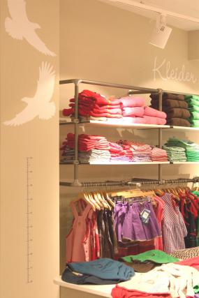 简约时尚童装店门头招牌效果图