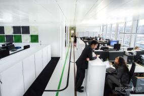 60平米写字间办公室文件柜摆放装修效果图